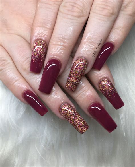 burgundy and gold nails